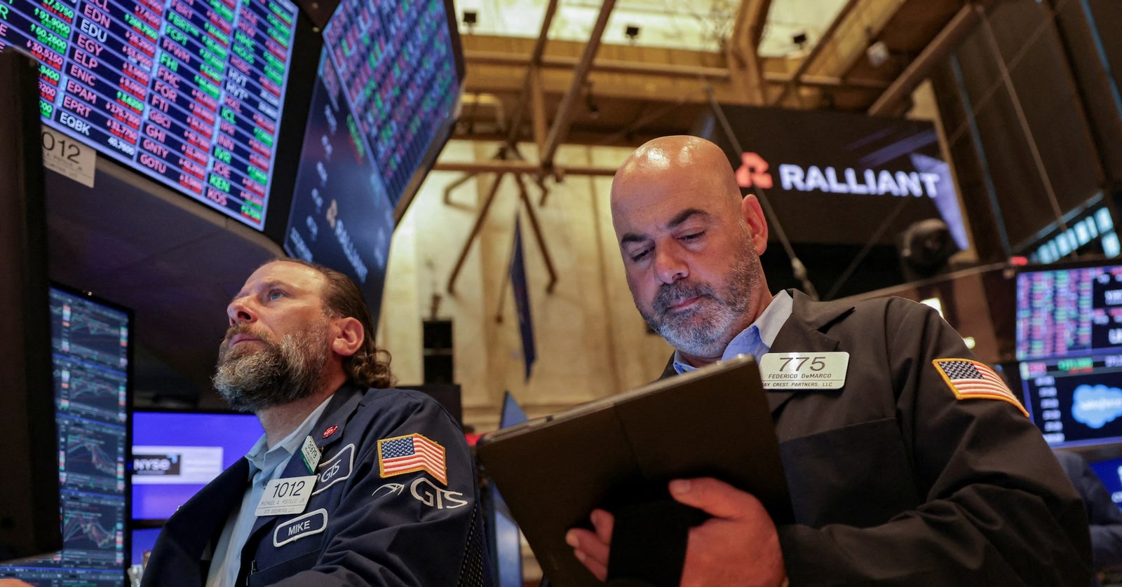 S&P 500 and Nasdaq hit records; Deckers soars 12%